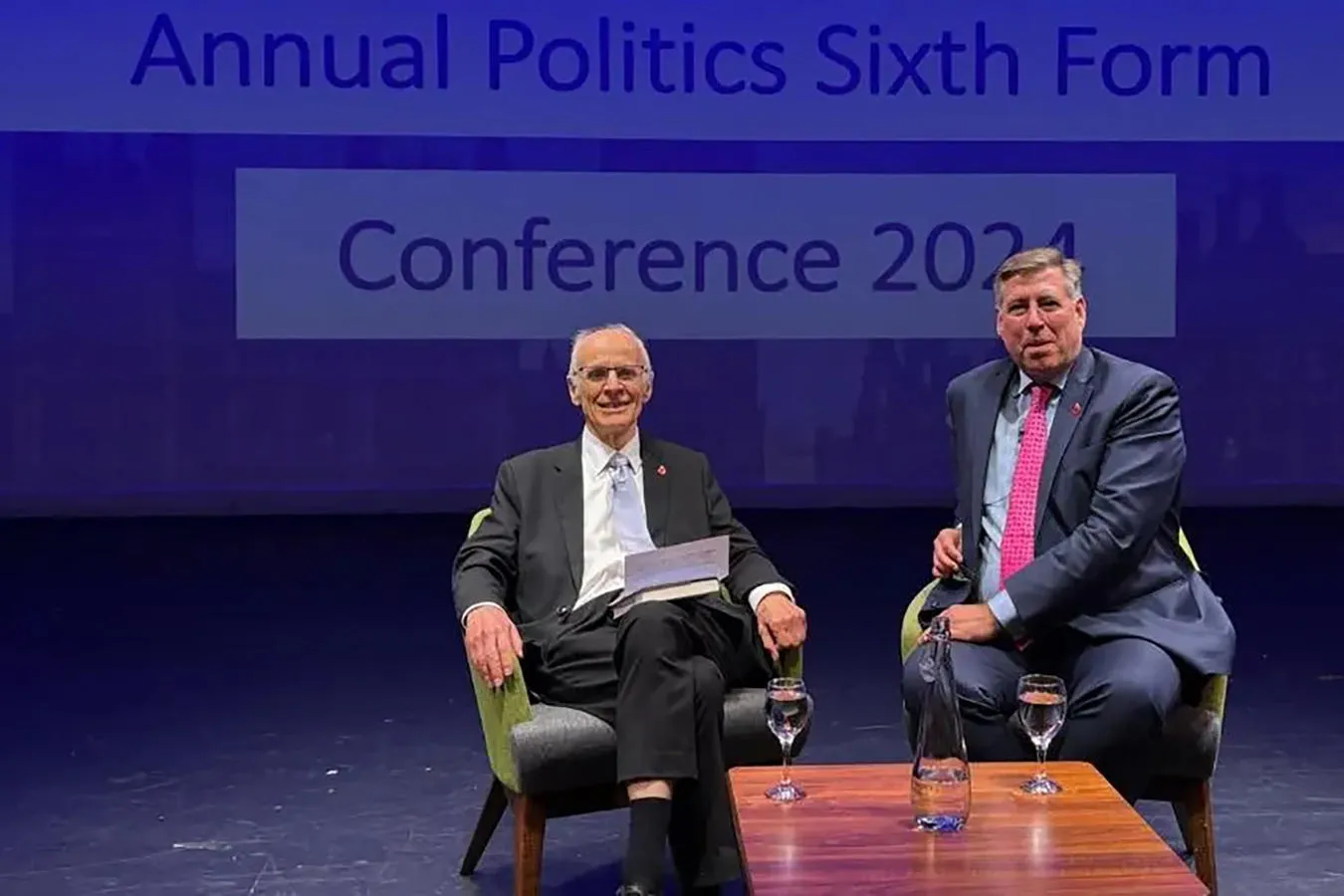 Lord Norton of Louth introducing a guest at the Inside Politics conference