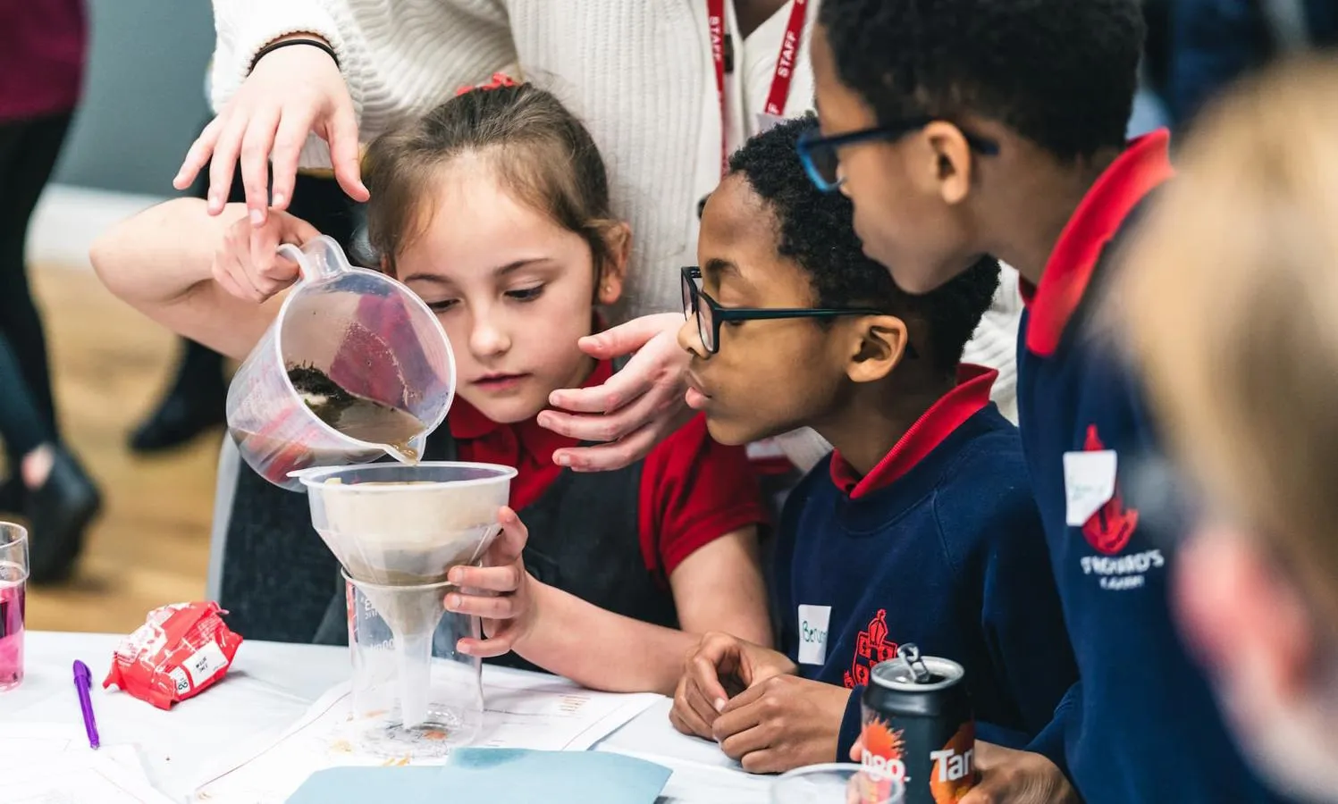Primary school children doing a science experience