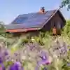 A house with solar panels on a sunny day.