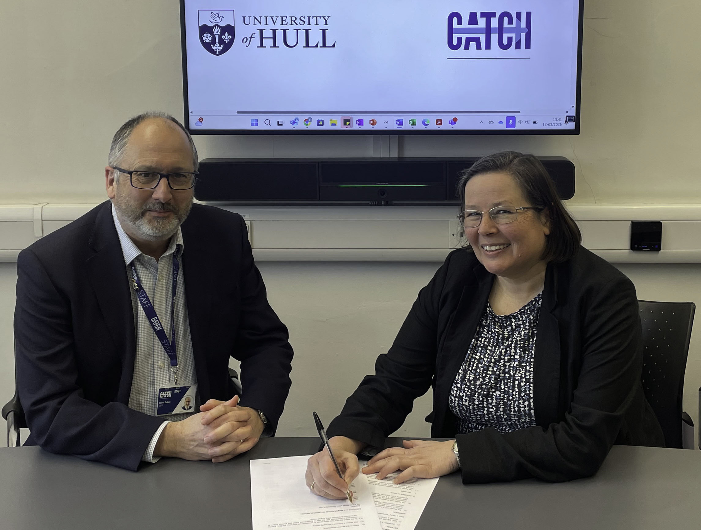 David Talbot and Fiona Matthews sign the partnership agreement