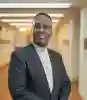 Dr Mark Minott