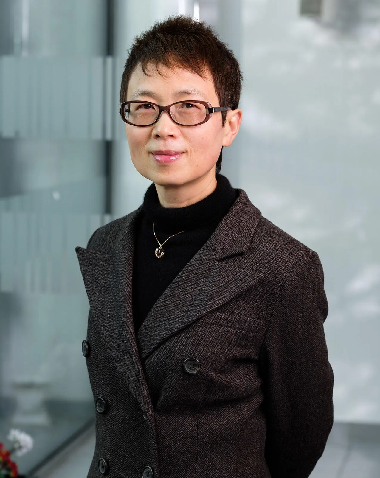 Dr. Qin Xiao