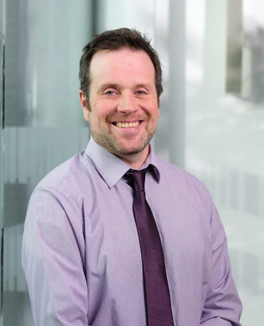 Man posing and smiling