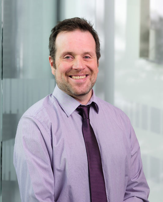 Man posing and smiling