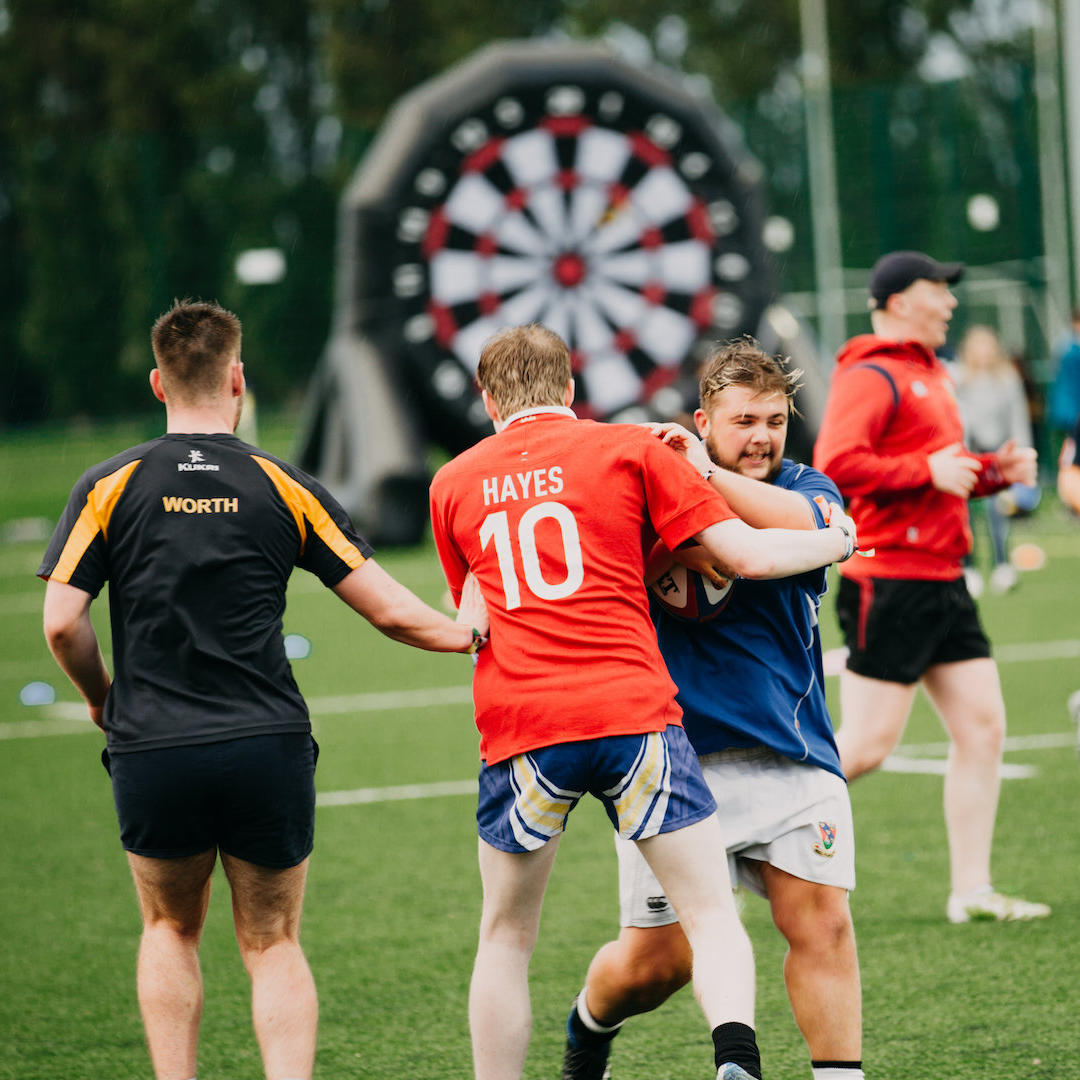 students playing on the new international-standard rugby pitch