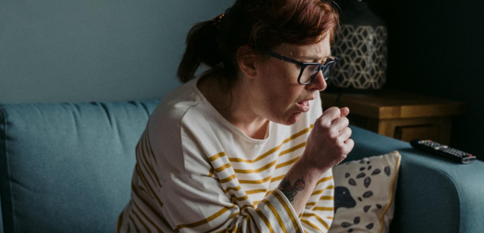 Woman coughing