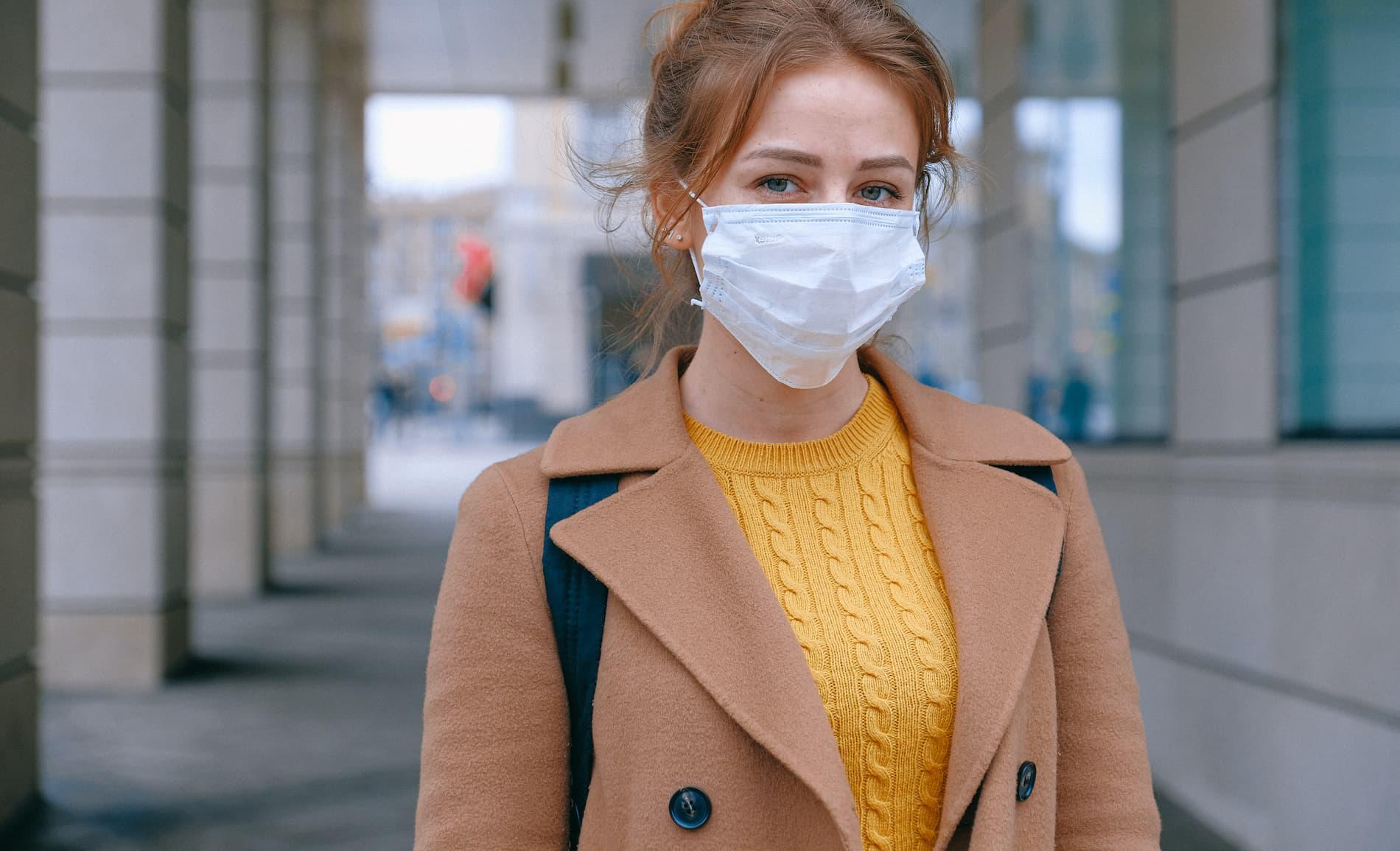 Woman wearing surgical face mask