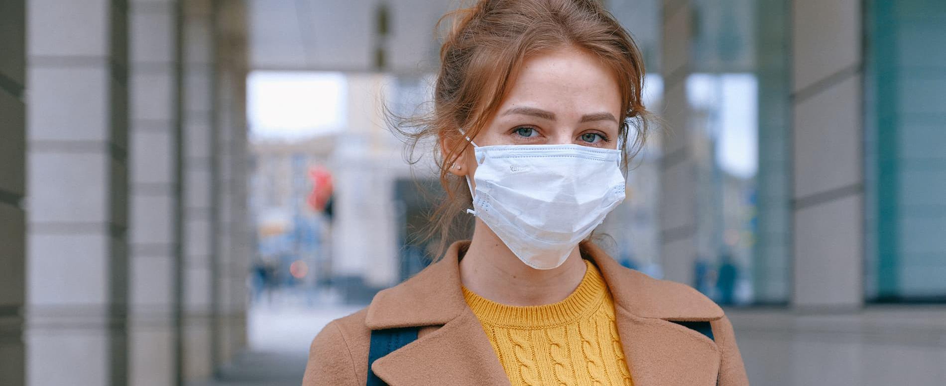 Woman wearing surgical face mask