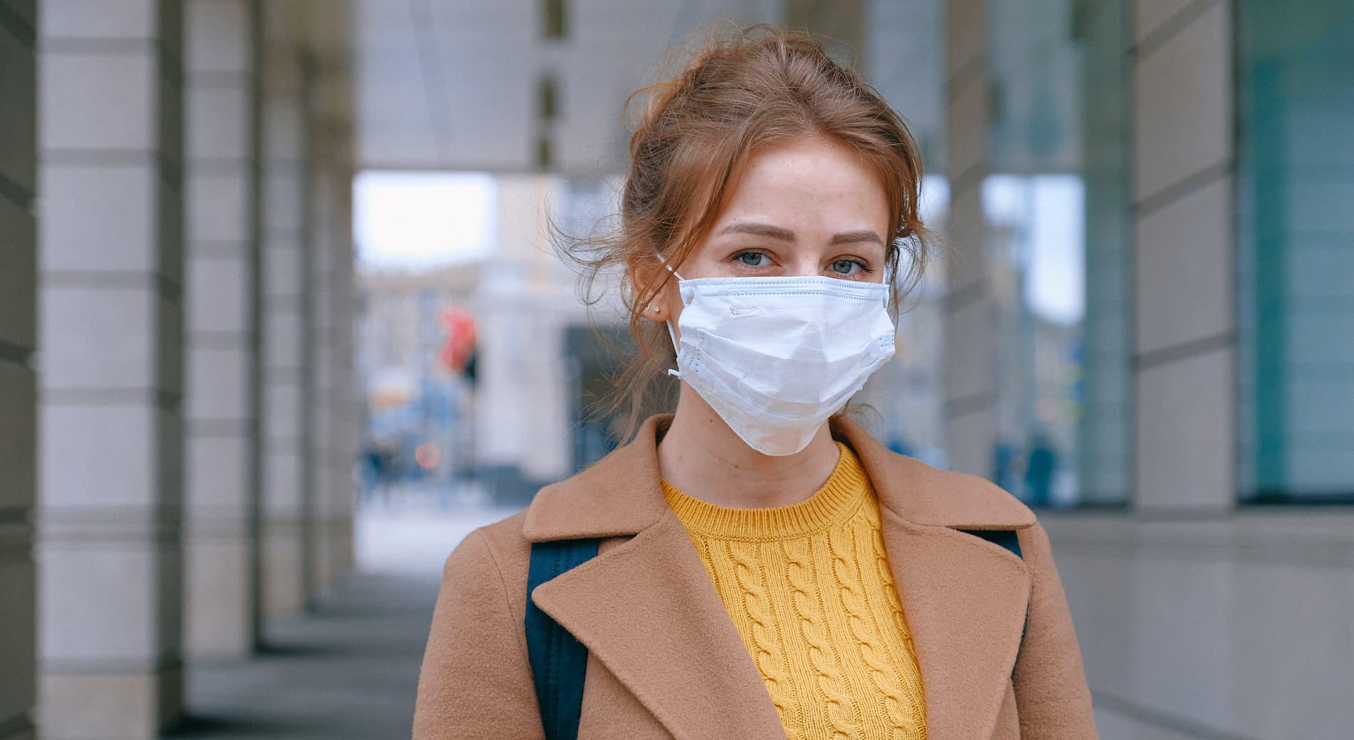 Woman wearing surgical face mask