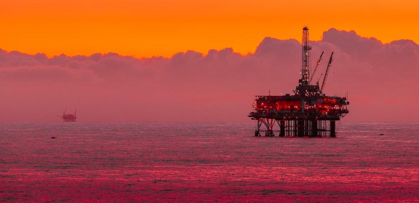 Oil rig at sunset