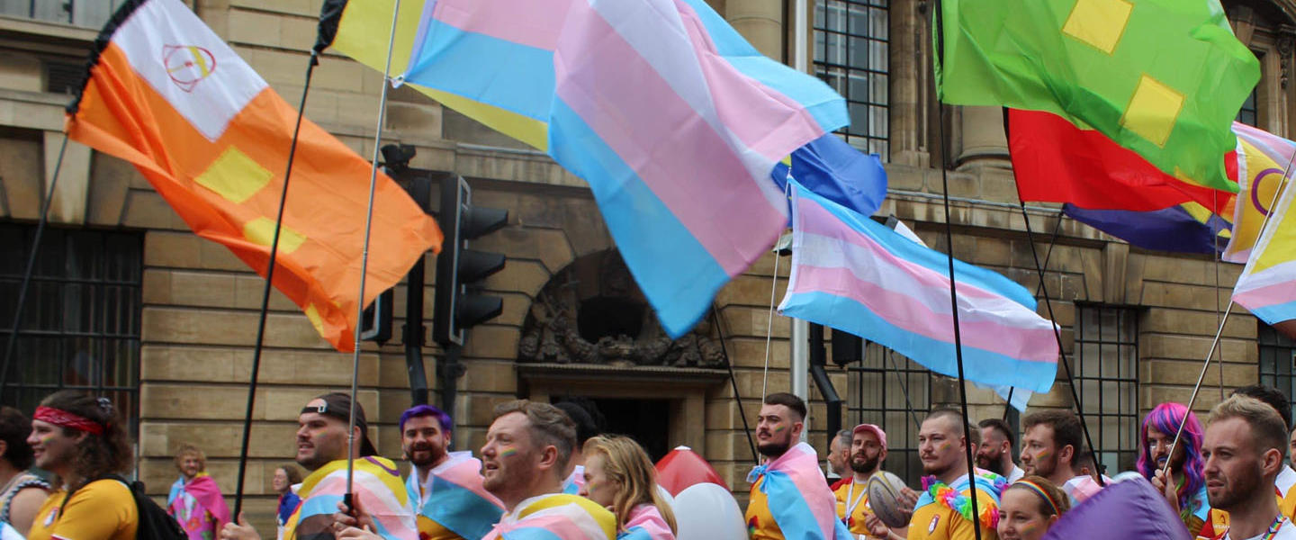rugby team parading through town for LGBTQIA+