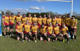 rugby team stood together under the scoring post