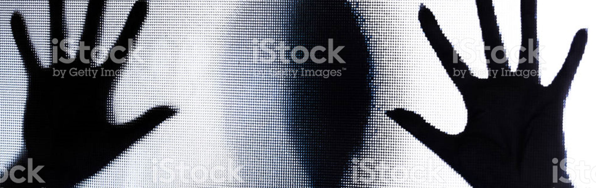 spooky-silhouette-of-trapped-abused-woman-with-hands-pressed-against-picture-id886010536