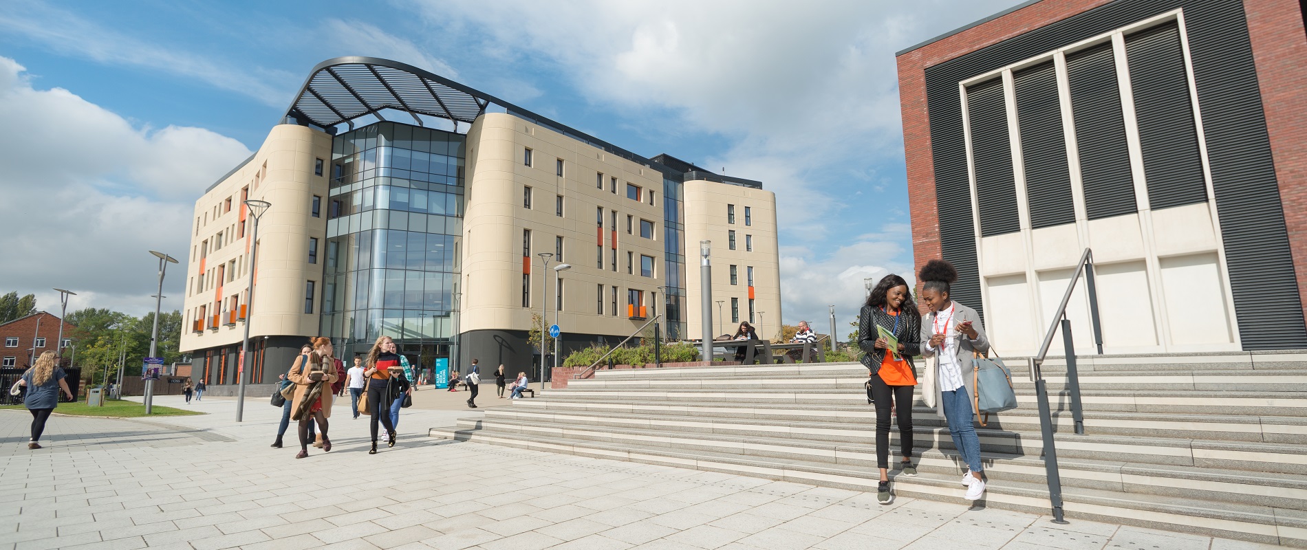 Students outside Allam Medical Building and Library UNI-6767