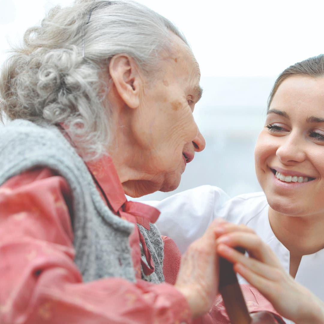 nurse with elderly patient