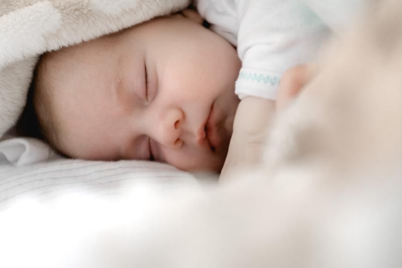 stock photo of baby in sheets